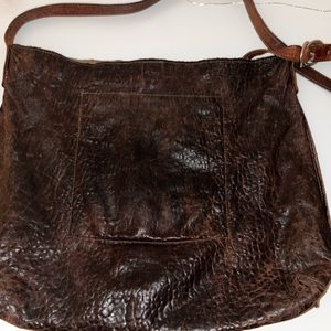 B. May leather crossbody